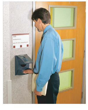 photo:  employee using Hand Geometry reader
